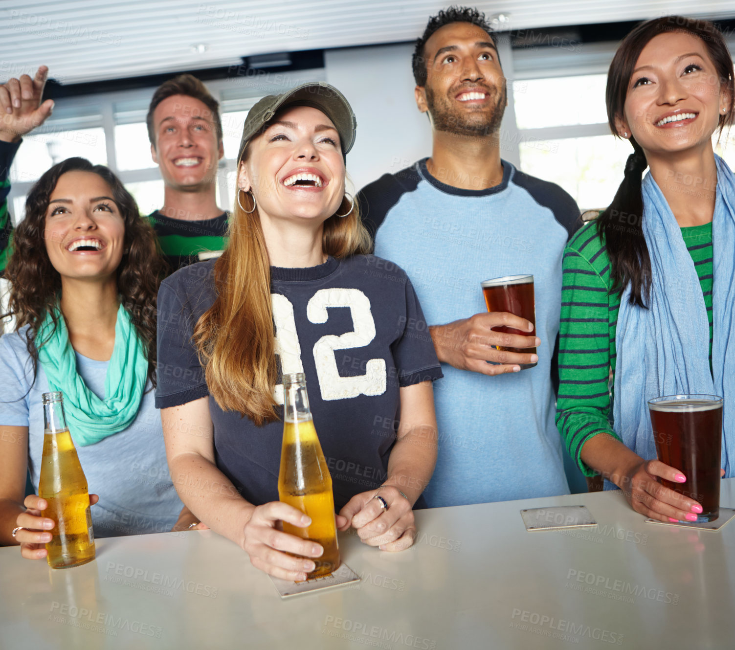 Buy stock photo Pub, football and group of fans with beer watching sports match with happiness for winning goal. Supporters, alcohol and friends streaming broadcast television of soccer game for league in bar.