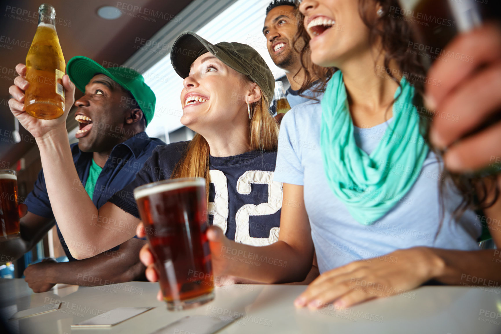 Buy stock photo Pub, football and group of sports fans with beer watching tournament match with happiness for win goal. Support, alcohol and friends streaming broadcast television of soccer game for league in bar.