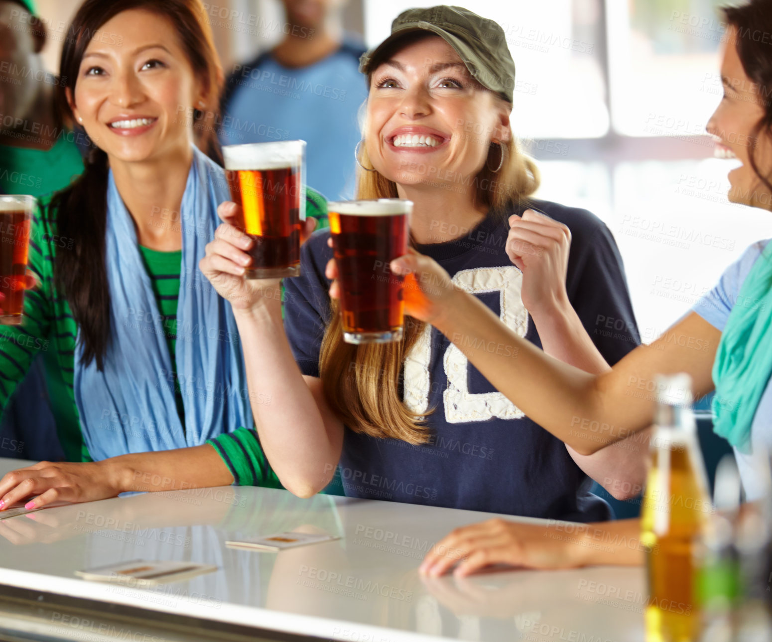 Buy stock photo Celebration, beer and people in pub with sports game, goal and cheers for support together. Excited, happy hour and group of friends with alcohol, drink and broadcast television for team match in bar