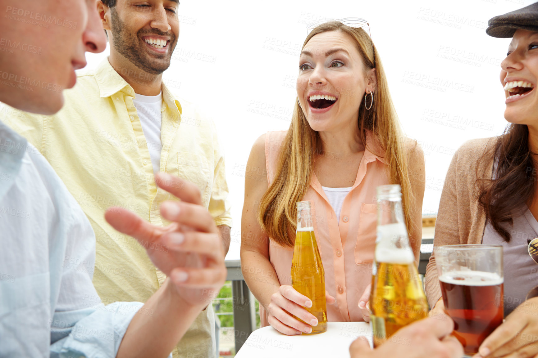 Buy stock photo A group of friends drinking and having a good time at a restaurant