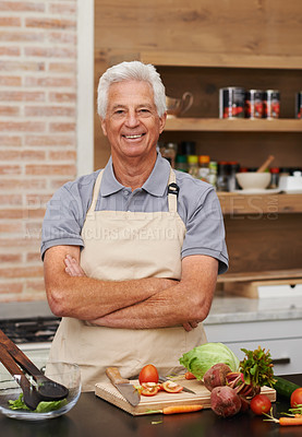 Buy stock photo Senior man, portrait and arms crossed in cooking, food and vegetables with apron and smile in kitchen. Mature person, happy and preparing meal at home for nutrition, healthy and eating in retirement