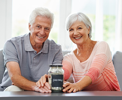 Buy stock photo Savings, investment and portrait of old couple with money in jar for retirement, fund or future plan. Senior, finance and cash in piggy bank in home to budget income for increase in financial freedom