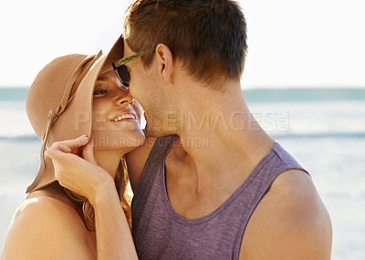 Buy stock photo Couple, hug and love on beach for travel, vacation and relax in summer by nature with care. Man, woman and embrace by ocean in Florida for adventure, holiday and freedom with romance, happy and smile