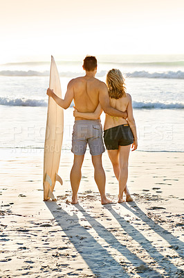 Buy stock photo Surfer man, couple and search for waves in summer at beach for vacation, exercise and fitness in ocean. Hug, woman and sport for training, challenge and adventure on holiday with sea and nature.
