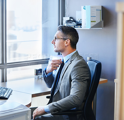 Buy stock photo Businessman, window and thinking in office for startup company, project and brainstorming ideas. Financial advisor, suit and sitting at desk in workplace for online banking, review and consulting