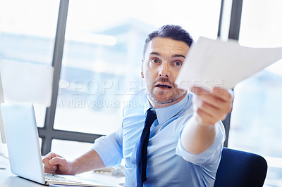Buy stock photo Business man, document and target date at desk in office with stress, technology and information for files. Frustrated editor, laptop and paperwork in workspace for deadline, review and tax return.