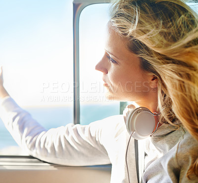 Buy stock photo Woman, relax and road trip with headphones on window open for freedom, travel or summer vacation. Female person, calm and thinking on cruise for exploring, weekend journey and transportation