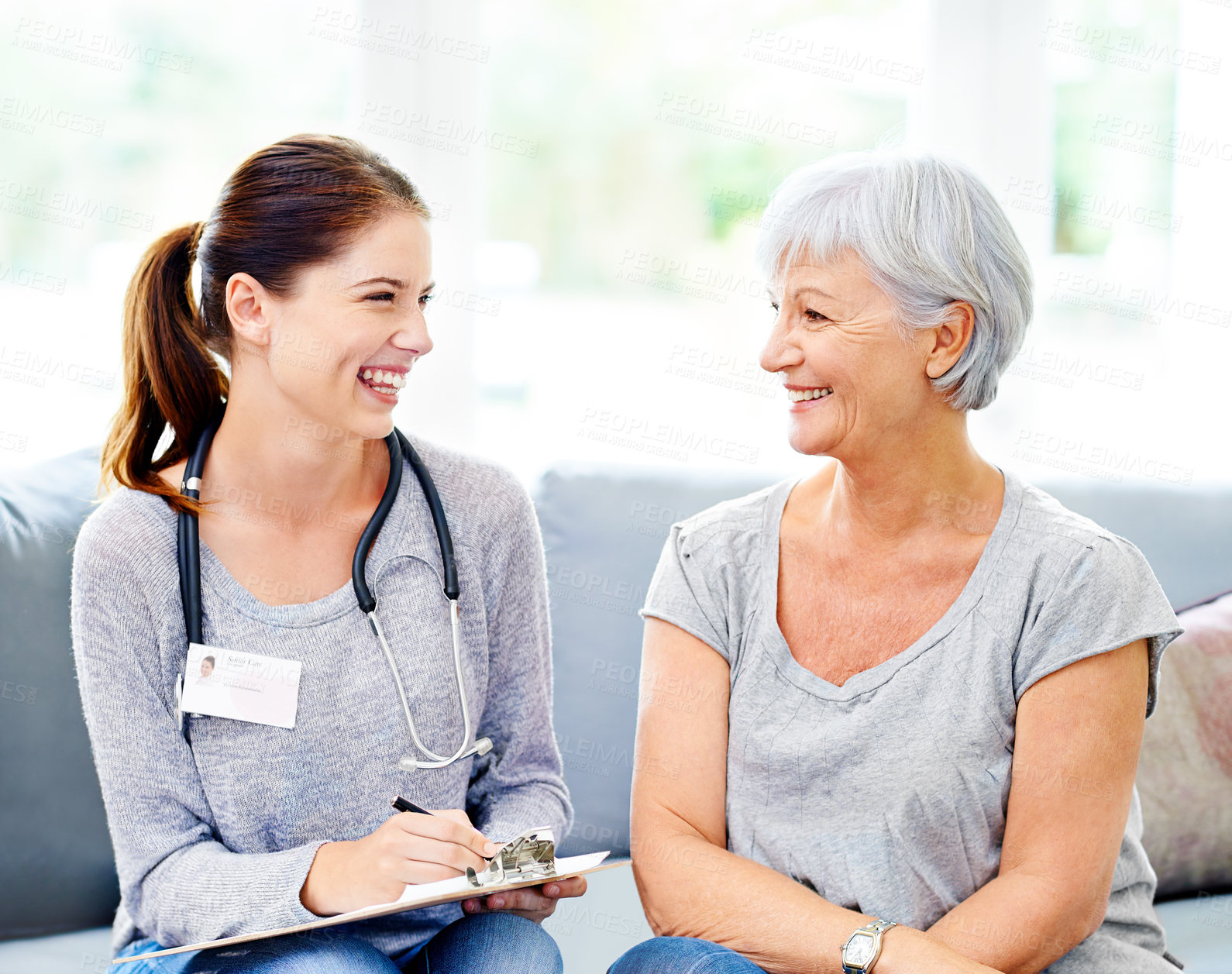 Buy stock photo Happy, doctor and senior patient with clipboard for results, diagnosis or update on health in clinic. Smile, nurse and elderly woman at appointment for checkup, healthcare and elderly care in office