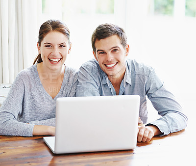 Buy stock photo Portrait, laptop and couple in home, smile and time together in apartment, break and weekend for love. House, woman and man in healthy relationship, happy and online for video, movies or subscription