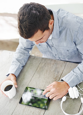 Buy stock photo Desk, coffee and man with typing on tablet for communication, connectivity and networking. Morning, contact and male person with digital technology on table for online blog, website and research
