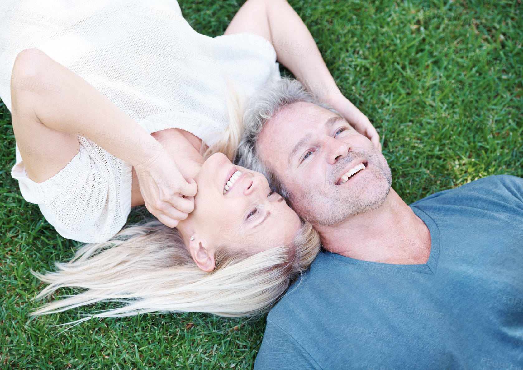 Buy stock photo Man, woman and mature marriage on grass from above for relaxing break or day off weekend, travel or meadow. Happy couple, field and laughing for funny joke in Australia for humor, connection or date