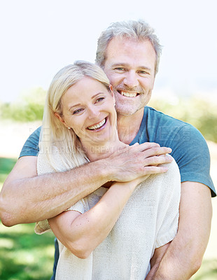 Buy stock photo Mature, couple and outdoor with embrace hug for romantic holiday or vacation anniversary, connection or relax. Man, woman and face or summer happy in meadow for bonding trip, marriage or together