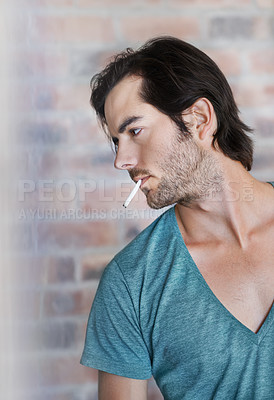 Buy stock photo Brick wall, man and smoking cigarette for relax, thinking and 420 for drug abuse problem on background. Nicotine, person and addiction to marijuana, weed and cbd for unhealthy cannabis in profile