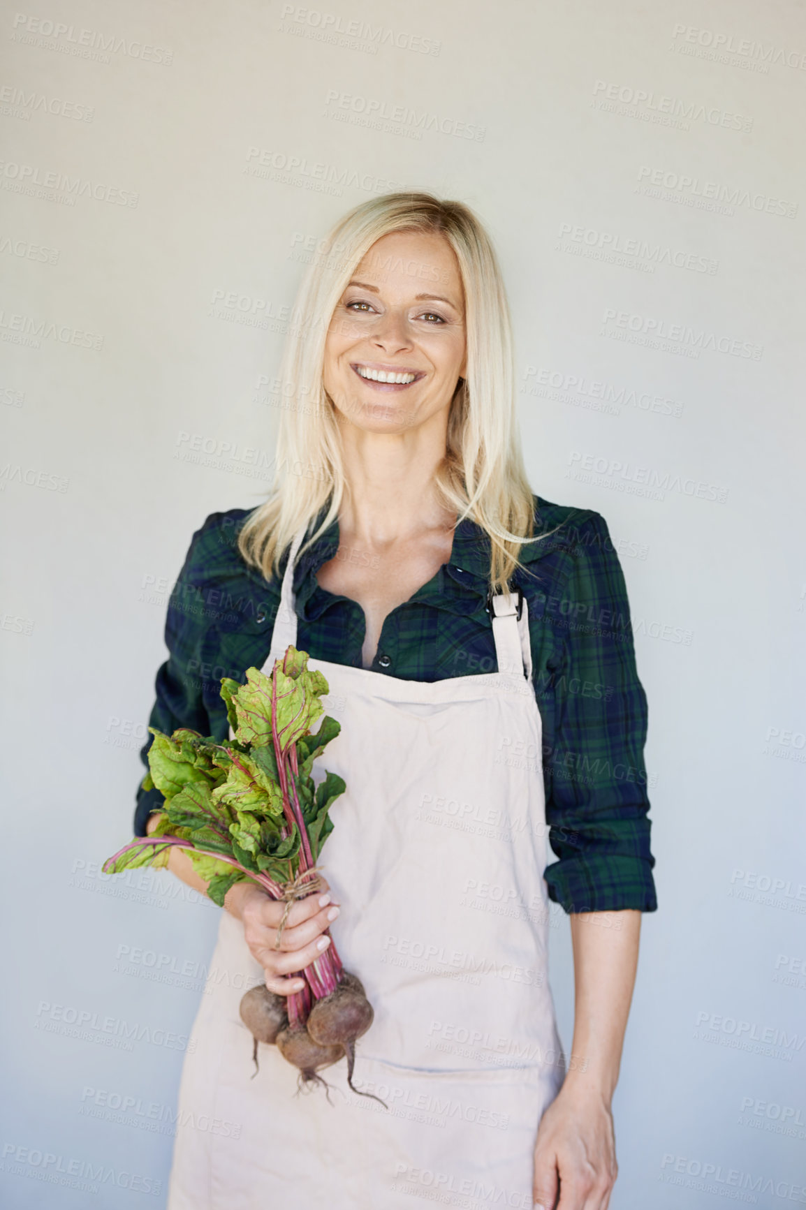 Buy stock photo Farming, beetroot and portrait of woman with produce for agriculture, harvest or organic food by wall. Growth, fresh vegetables and person with apron for agro business, gardening or sustainability