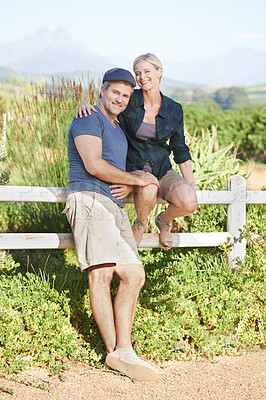 Buy stock photo A happy mature couple spending time on a farm together