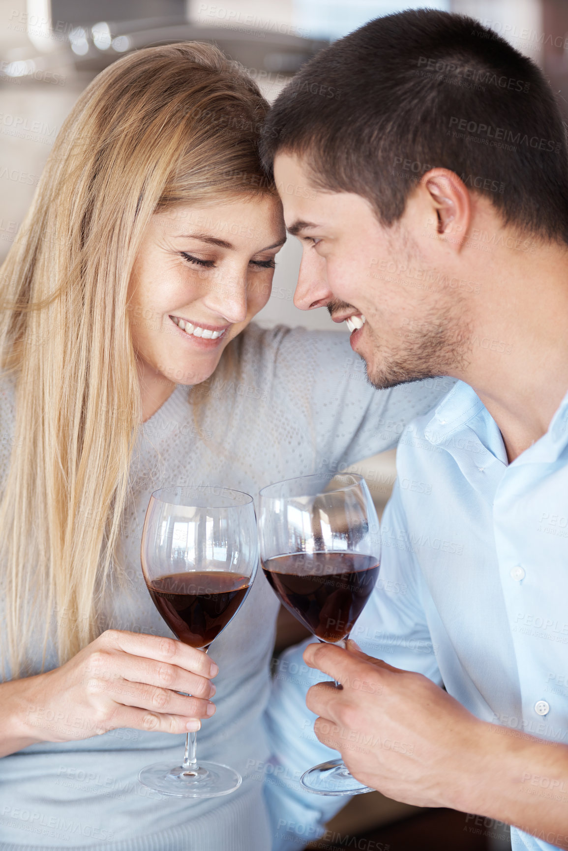 Buy stock photo Happy couple, wine and cheers with glass for date, love or romance in kitchen at home. Man and woman with smile enjoying alcohol, drink or beverage together on romantic dinner, meal or lunch at house