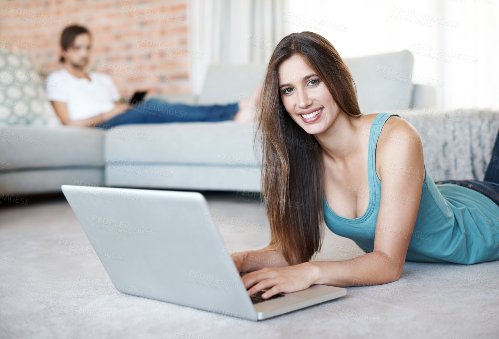 Buy stock photo Woman, relax and streaming on laptop in home and watch video online on floor with happiness. Typing, portrait and person on computer reading news, info or ebook on website on holiday or vacation