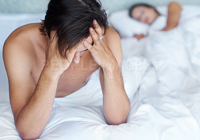 Buy stock photo Man, depressed and bed with partner in bedroom for stress, headache and toxic relationship at home. Mental health, sad person and woman asleep for disagreement, anger and erectile dysfunction