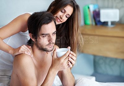 Buy stock photo Man, woman and embrace with coffee in bed with care, bonding and wake up with greeting in home. Couple, bedroom and touch with connection, love and relax with tea cup to start morning at apartment