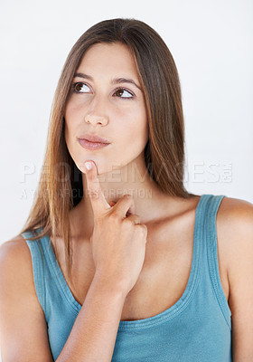 Buy stock photo Thinking, idea and woman in studio with vision, choosing and decision against white background space. Ideas, choice and girl planning, pensive and thoughtful while standing, contemplate and isolated