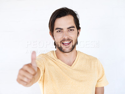 Buy stock photo Thumbs up, portrait and man in studio, white background or isolated review. Happy male model, thumb up and support of yes agreement, celebration and like emoji for vote of trust, thank you or success