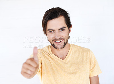 Buy stock photo Thumbs up, winner and portrait of man in studio, white background or isolated emoji. Male model, thumb up and support of yes agreement, celebration and hand sign, vote or trust, thank you and success