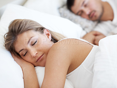 Buy stock photo Attractive young couple fast asleep together in bed