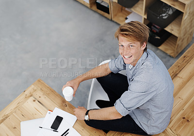 Buy stock photo Portrait, relax and man with coffee in office, graphic designer and startup for creative agency. Face, person and entrepreneur with morning tea, business owner and break for cappuccino and happiness