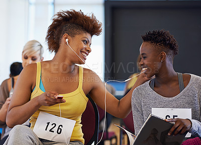 Buy stock photo Waiting, music and people in studio casting audition to sign up for performance or acting in theater. Dancers, streaming radio or women listening to song playlist or friends at academy in talent show