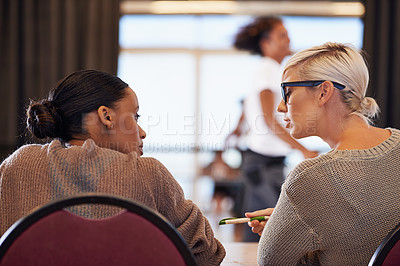 Buy stock photo Shot of two judges discussing their decision after a dance audition