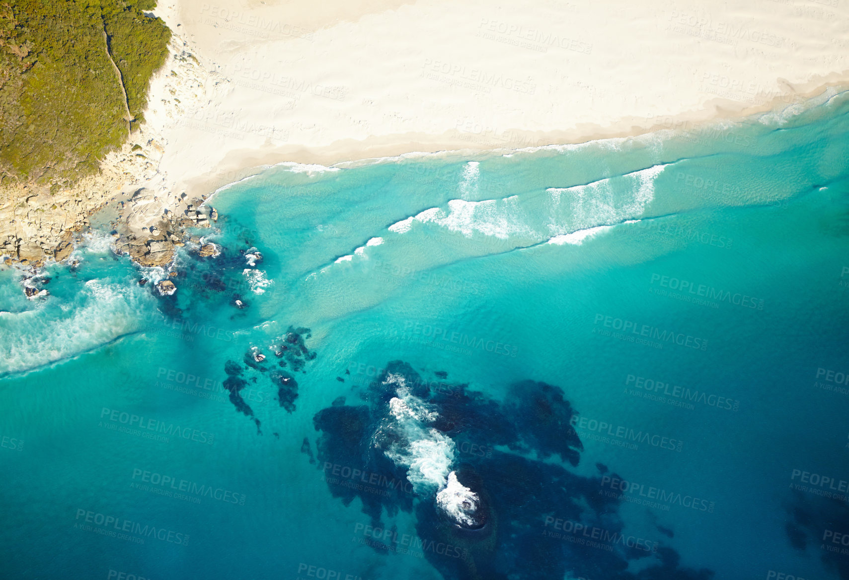 Buy stock photo Aerial shot of a secluded beach and it's turquoise water