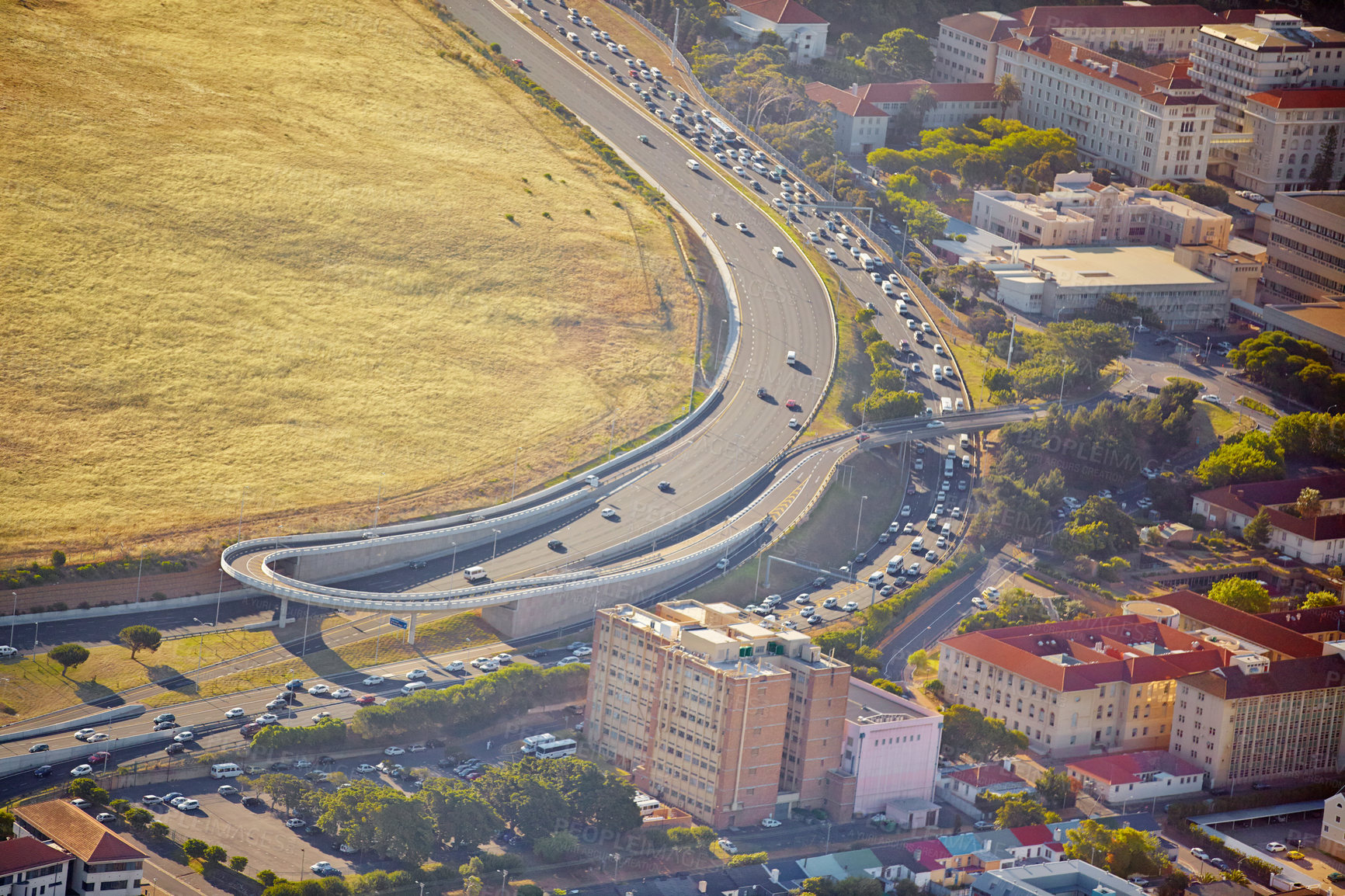 Buy stock photo Aerial view, city and nature of road, location and destination for vacation, explore and travel. Tourism, drone and adventure in Sydney, Australia and street in hill, buildings and trip for holiday