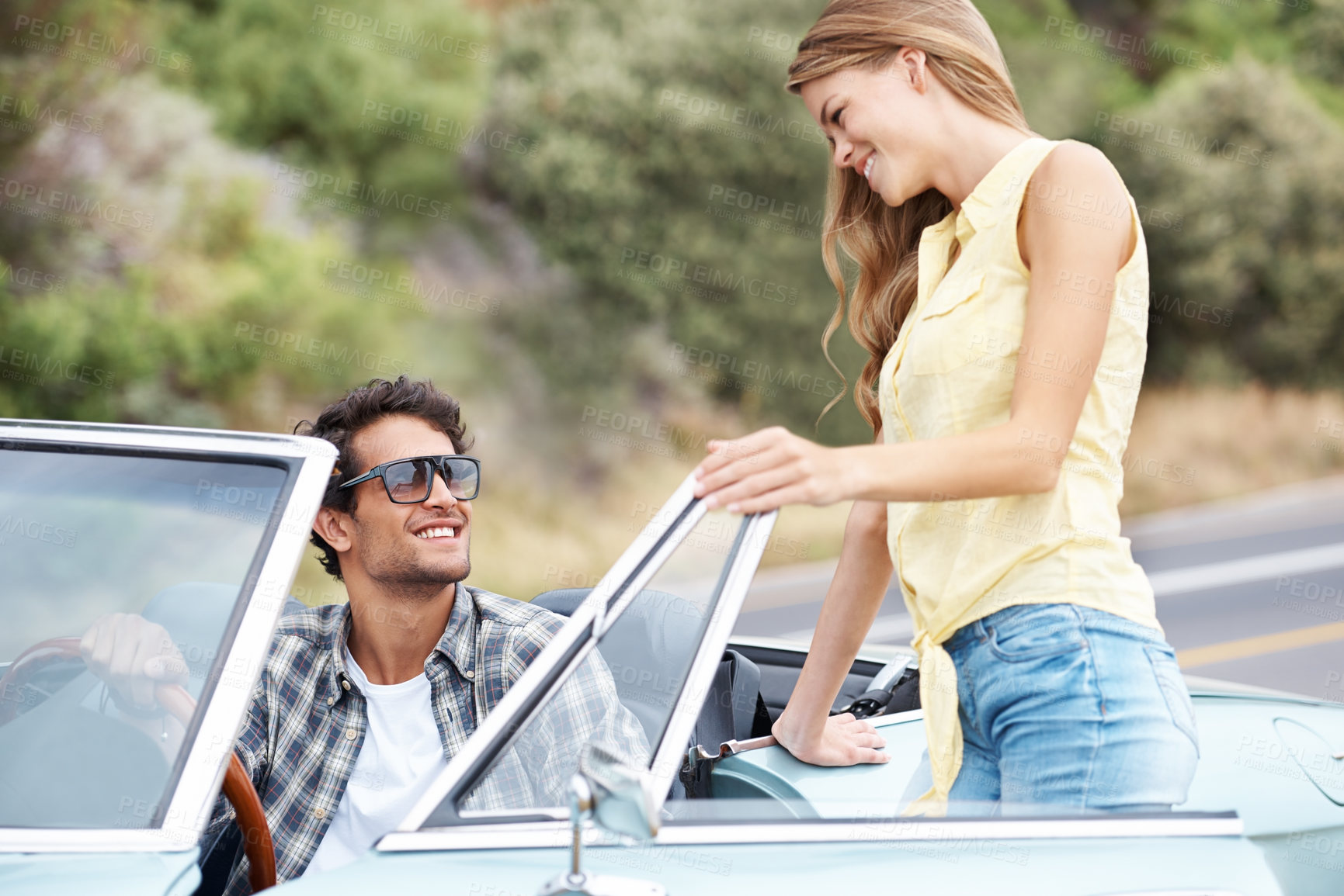 Buy stock photo Happy, talking or couple in countryside on road trip on holiday together for love, travel or adventure. Break, convertible or people in car on outdoor vacation for journey, drive or honeymoon romance