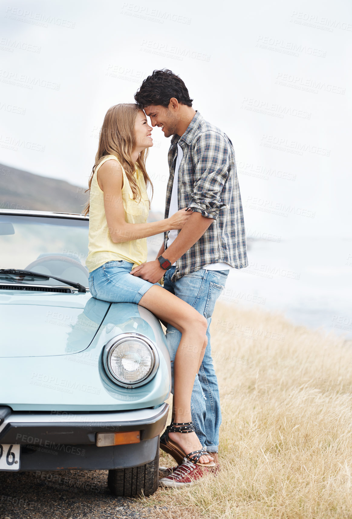 Buy stock photo Smile, road trip and couple by car with love for travel, holiday journey and honeymoon for happy marriage. Outdoor, man and woman in convertible motor for vacation adventure and relationship trust