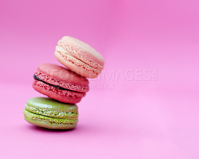 Buy stock photo Macaroons, cake and stack of French sweets with variety, delicacy and treats on pink background. Baked dessert, luxury or different flavors of candy for bakery, fine dining and cookies with copyspace