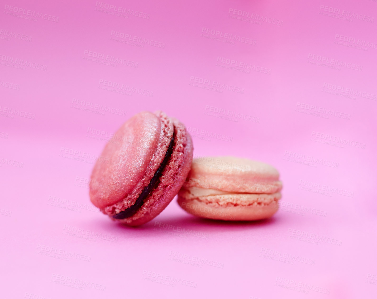 Buy stock photo Macaroons, luxury and display of French sweets with variety, delicacy and treats on pink background. Baked candy, dessert and different flavors of confectionery for bakery, fine dining and cookies