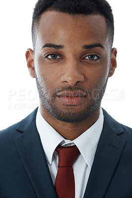 Buy stock photo Cropped portrait of a serious young businessman isolated on white
