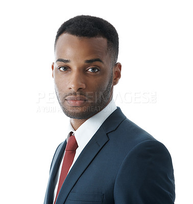 Buy stock photo A serious young businessman looking at the camera while isolated on white