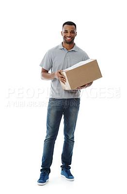 Buy stock photo A smiling deliveryman holding a box while isolated on white