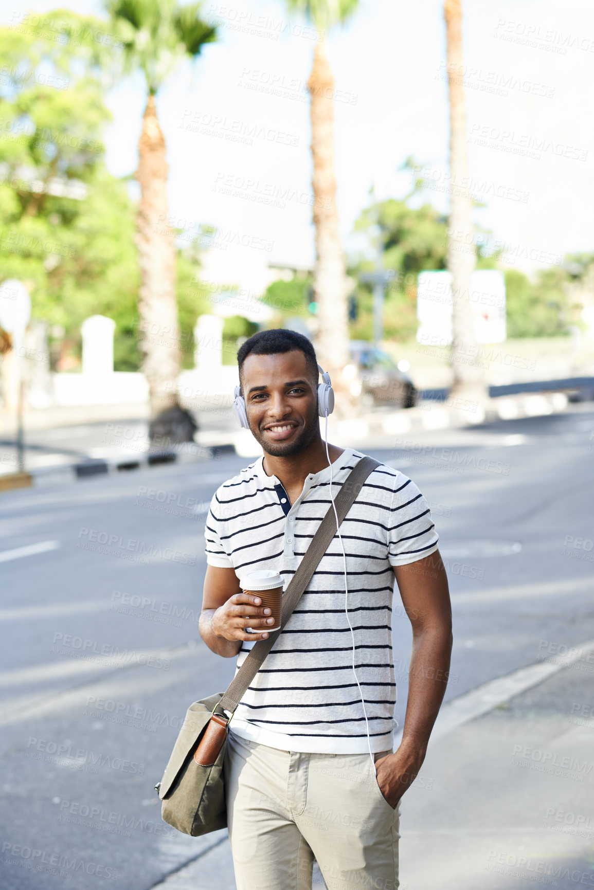 Buy stock photo Black man, headphones and coffee portrait in outdoor, walking and employee for city adventure. Male person, espresso and streaming sound or audio on commute journey, travel and tea in urban town