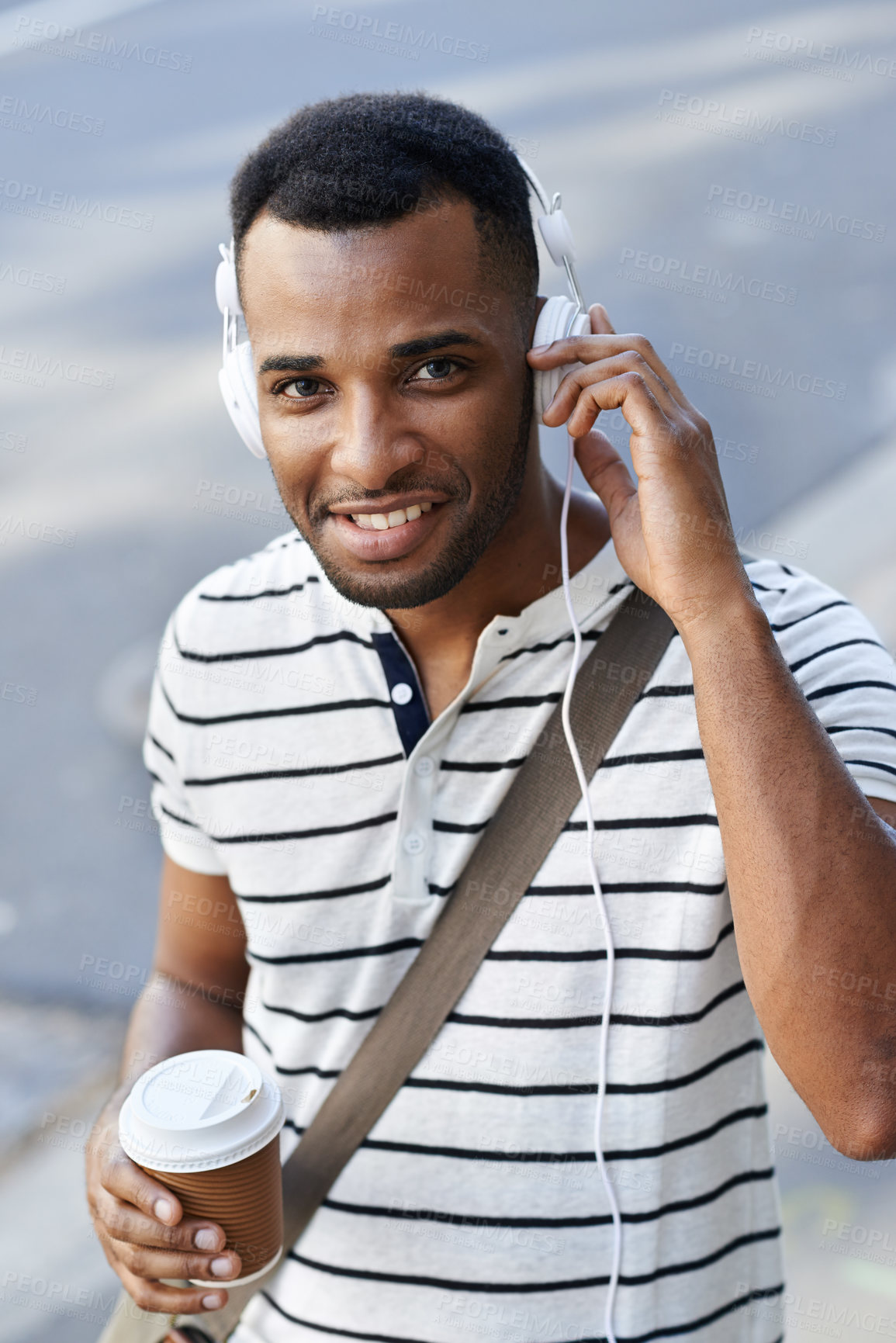 Buy stock photo Black man, headphones and coffee portrait in city, walking and employee listening in outdoor. Male person, espresso and streaming sound or audio on commute journey, travel and tea in urban town