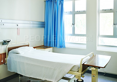 Buy stock photo Hospital, healthcare and bed in empty room for healing and consulting for recovery or support. Curtains, wellness and furniture in clinic for service, emergency and rehabilitation for sick patient 