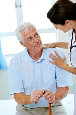 Buy stock photo Support, nurse and old man with cane in hospital for advice, help and rehab at senior care clinic. Healthcare in retirement, counselling and elderly patient with disability on bed with woman doctor