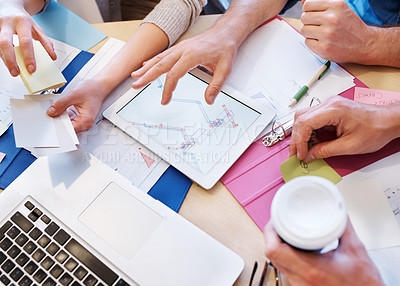 Buy stock photo Closeup shot of people using a tablet in a planning meeting