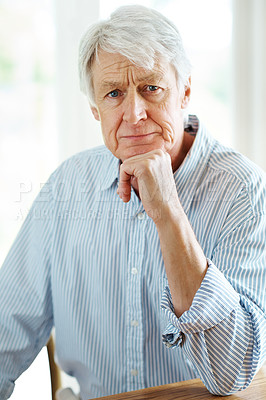 Buy stock photo Thinking, portrait and senior man in home for retirement, concerned and worry for future. Pensioner, frown and anxiety in living room for finances, question and reflection on memories in Canada