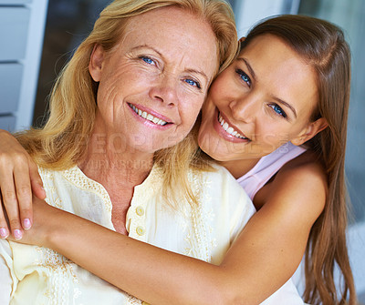 Buy stock photo Portrait of a loving grandchild bonding with her grandmother