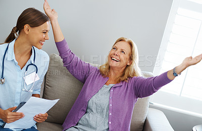 Buy stock photo Celebration, consulting or results with nurse and old woman on sofa in living room of home together. Healthcare, medical or recovery with physiotherapist and senior patient cheering in apartment