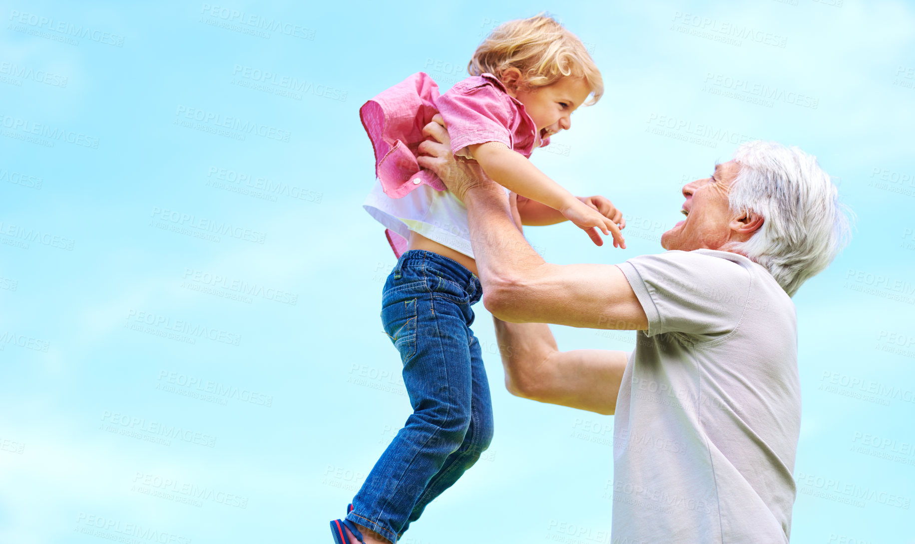 Buy stock photo Happy, lifting and fun with grandfather and grandson for bonding, affectionate and free time space. Happiness, smile and playing with old man and young boy for family, generations and blue sky mockup