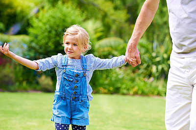 Buy stock photo Holding hands, dad or child in garden for piggyback, love or bonding together for single parent or careField, girl or father in backyard for support, care or playing with smile, growth o playful kid