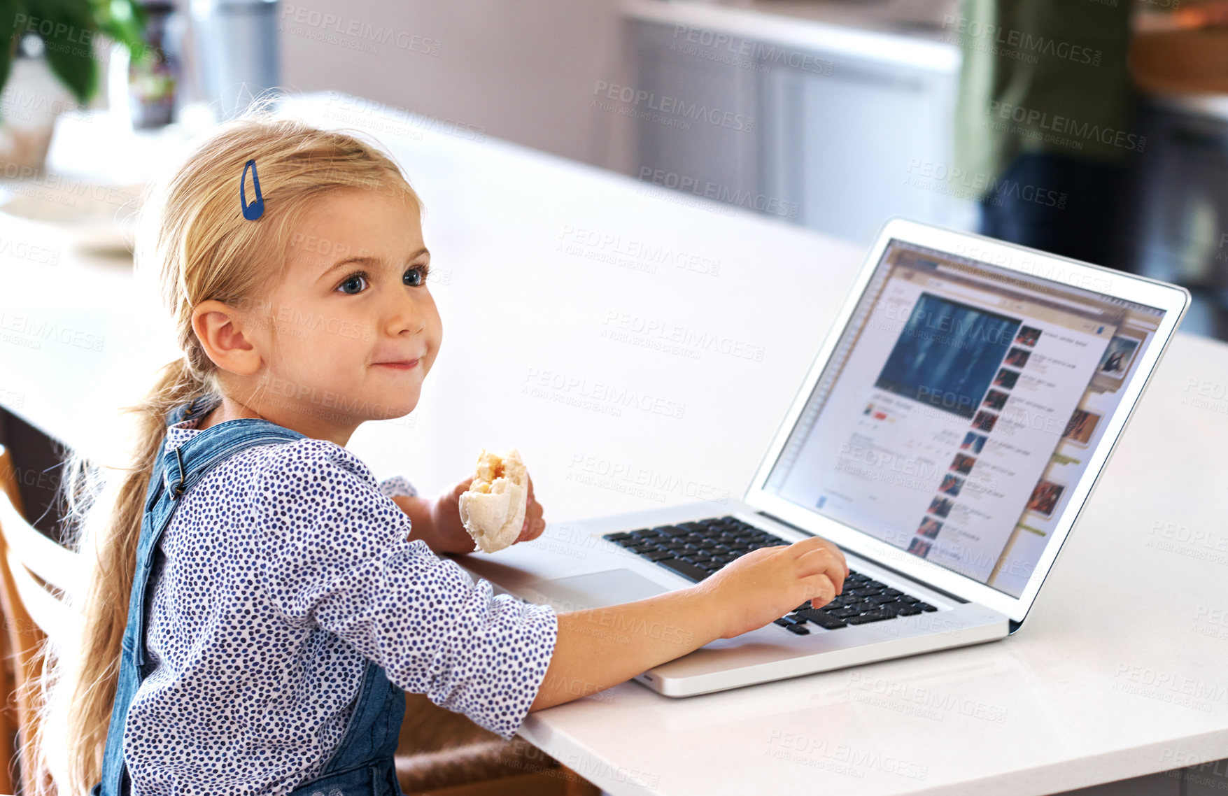 Buy stock photo Child, laptop and happy in kitchen for education, online and internet for e learning at table. Kid, snack and screen for social media in home and streaming, digital app or website for communication